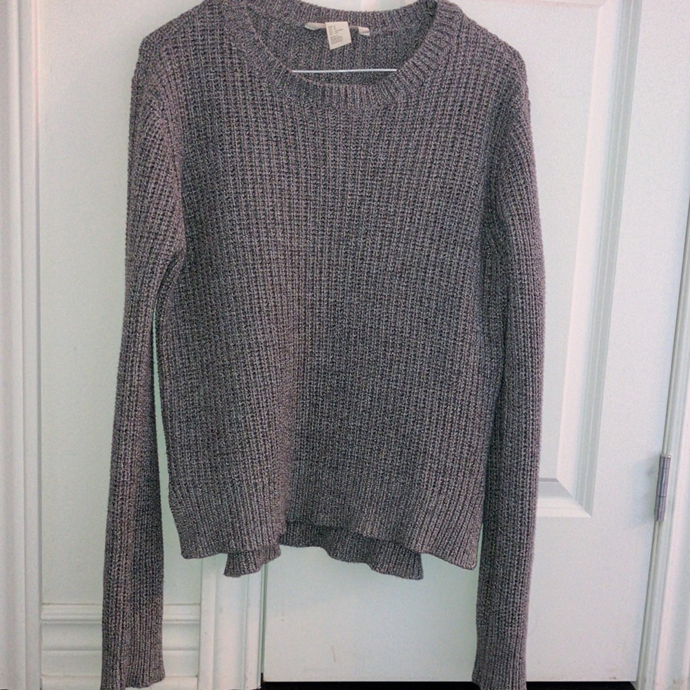 Gray knit sweater with zippers on the side